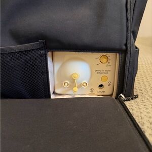 Medela Pump with Black and Gold Design